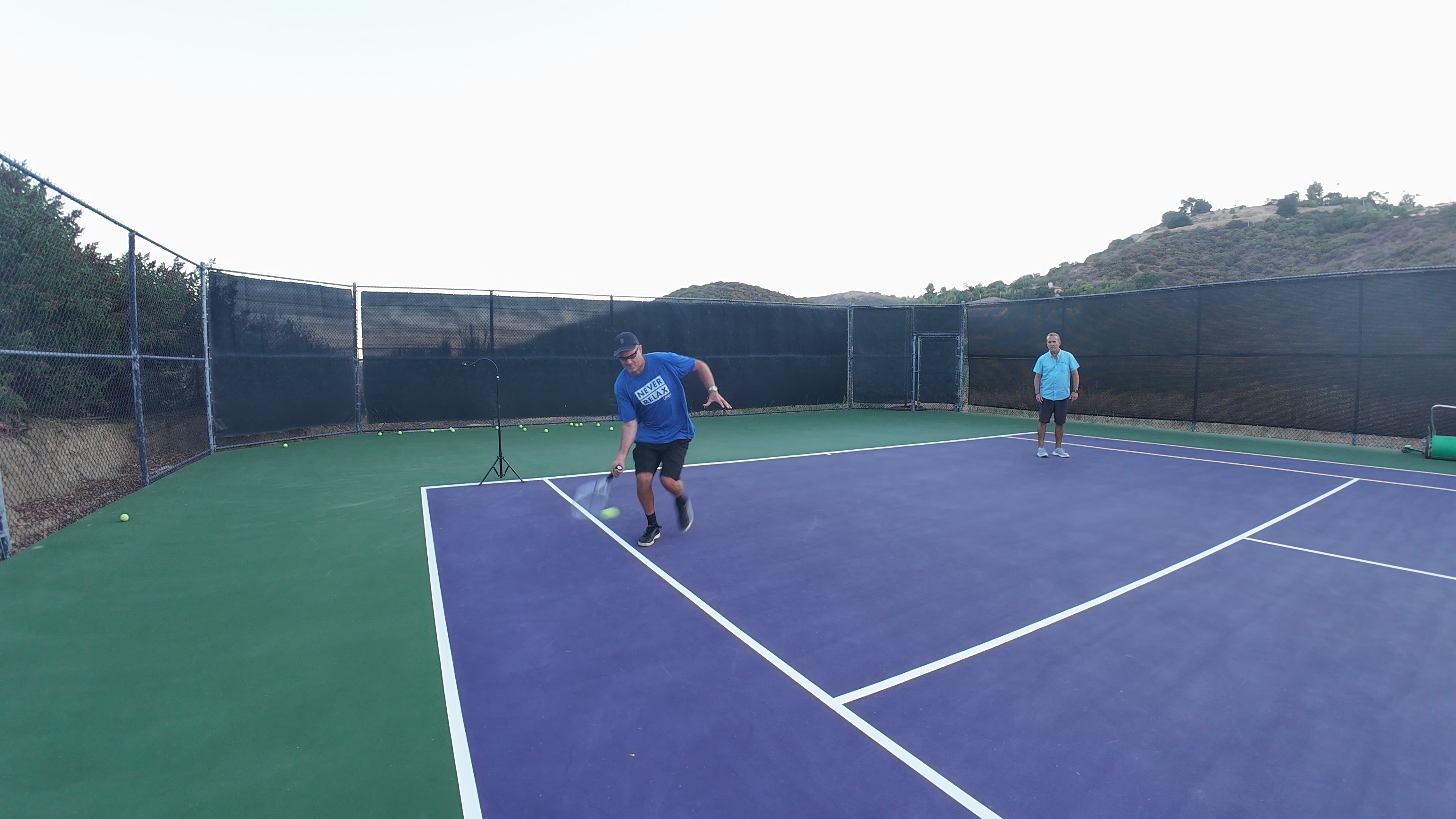 Bill Behrens hitting the Forehand Hook down the line